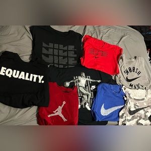 8 shirts. Nike and Jordan, most of them were only used a couple times.